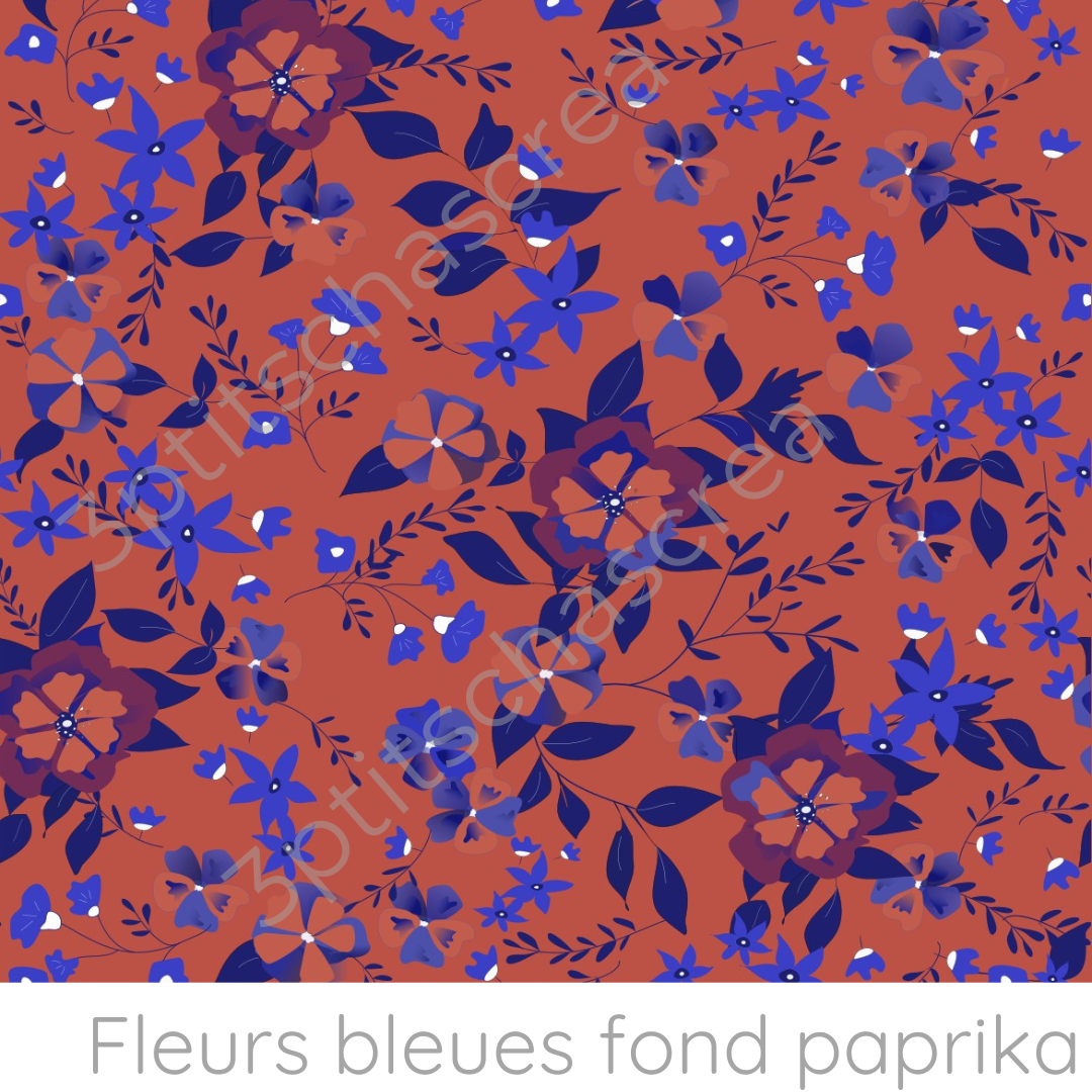 motif fleurs bleues fond paprika